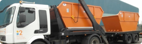Two open skips for hire on a 2recycling lorry